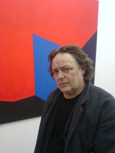 Michael Jansen - in front of his painting